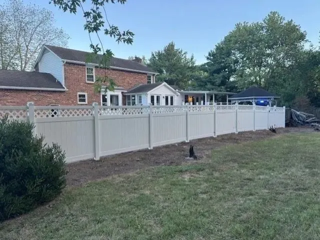 Tan vinyl fencing project